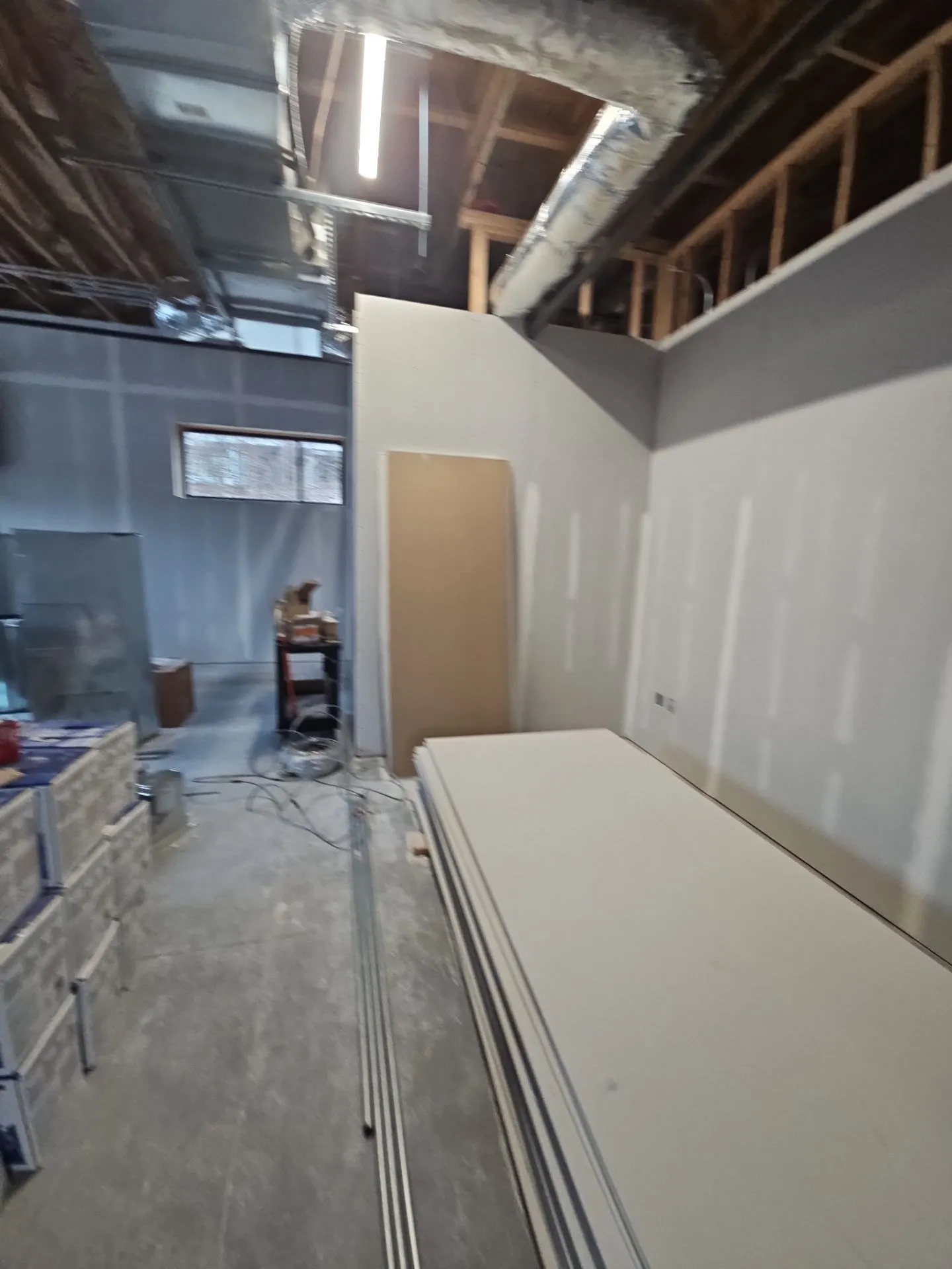 Drywall walls taking shape within a Kansas City commercial interior build-out